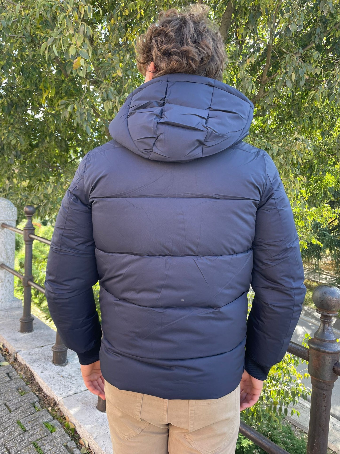 Giubbotto uomo imbottito in piumino e tessuto tecnico