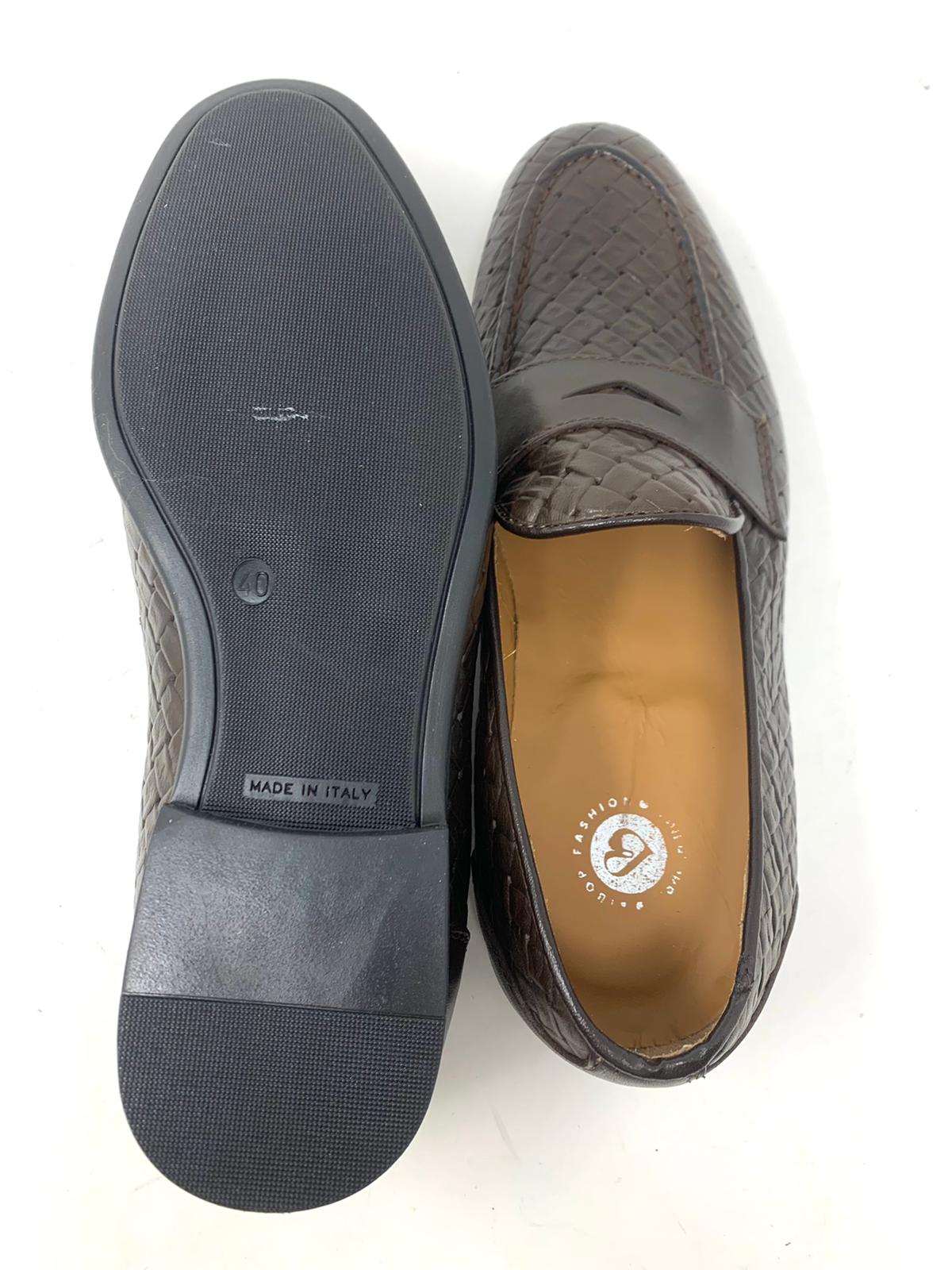 Woven leather moccasin with rubber sole