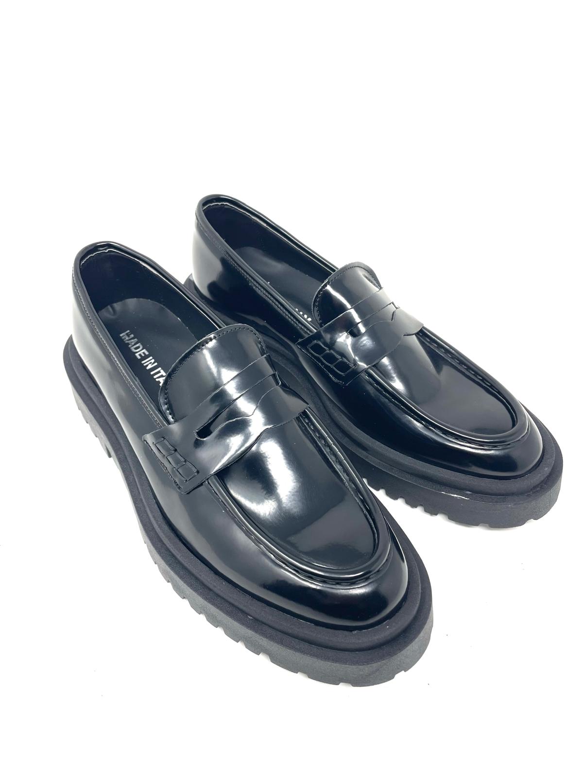 Mocassino rocciatore  vera pelle fondo ambra
made in italy