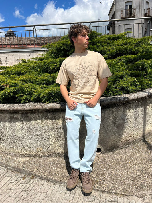 Jeans Uomo – Lavaggio Chiaro con Strappi in Tela Ferma