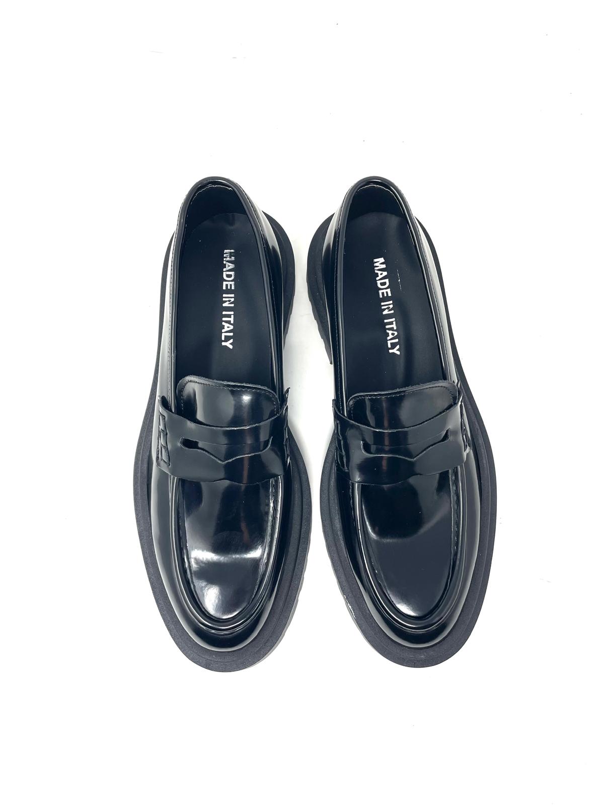 Mocassino rocciatore  vera pelle fondo ambra
made in italy