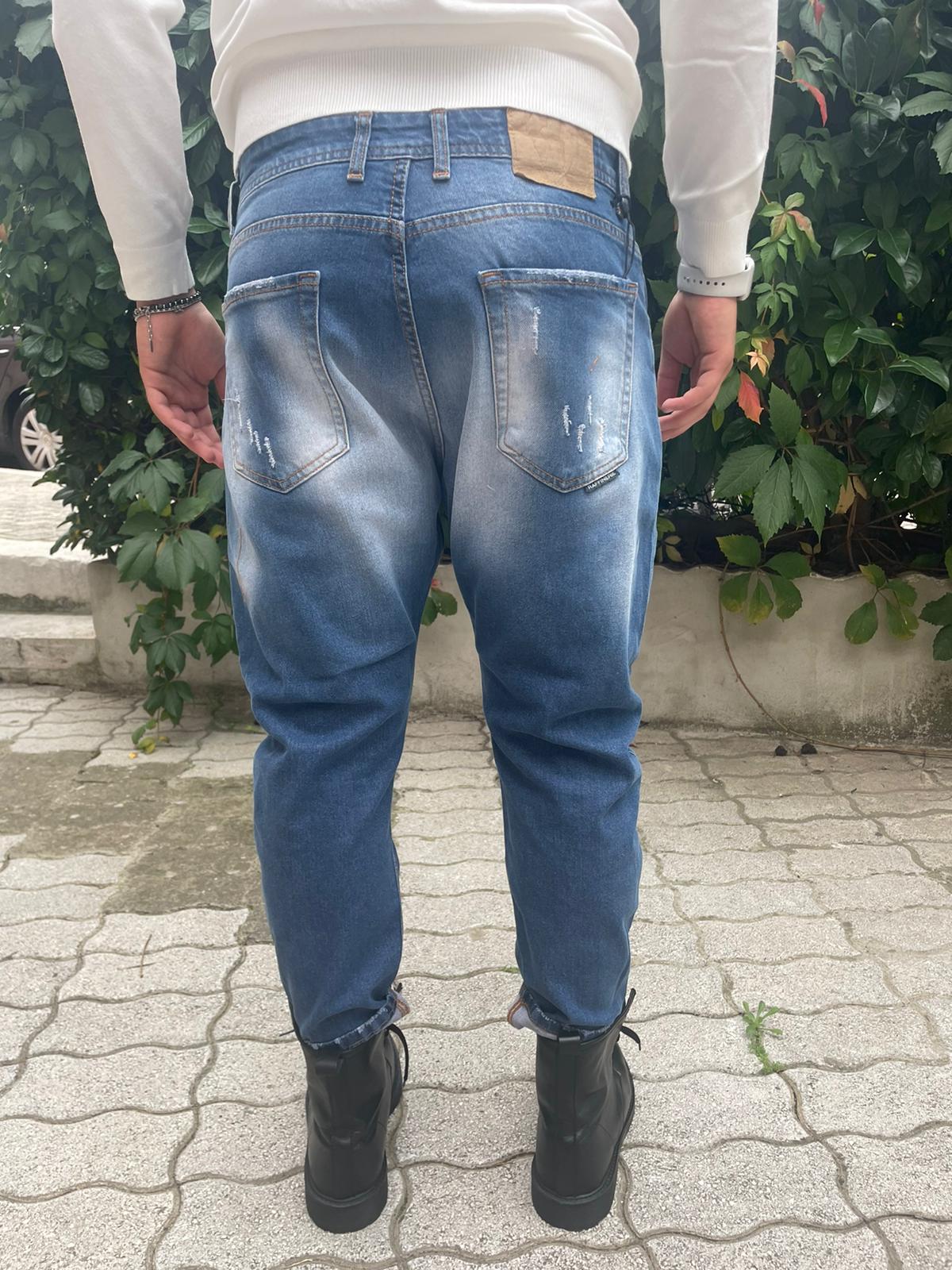 jeans strappetti e rattoppi  slavato slim fit