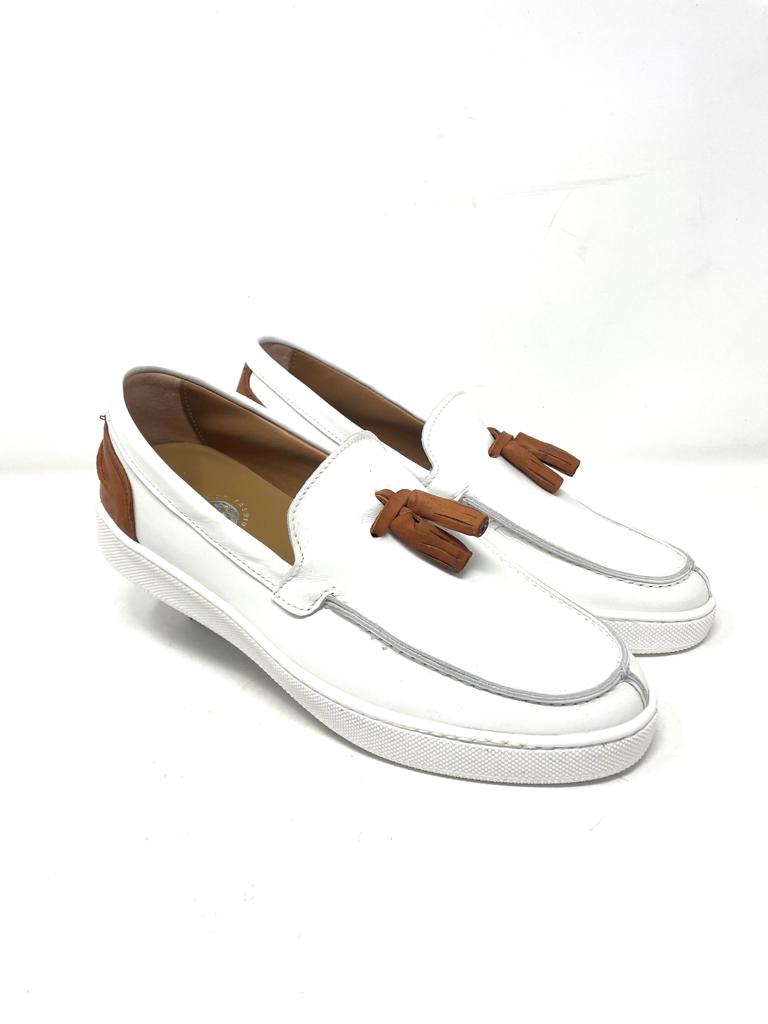Two-tone leather tassel boat moccasin with stitched rubber sole