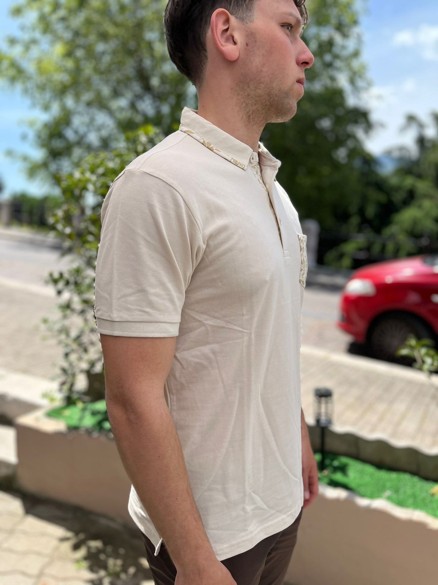 Polo  tasca a fiori cotone pique