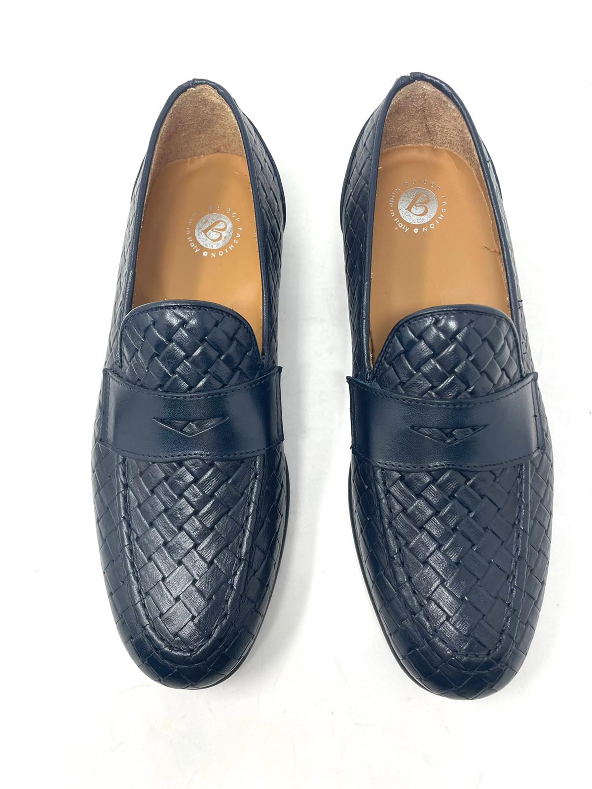 Woven leather moccasin with rubber sole
