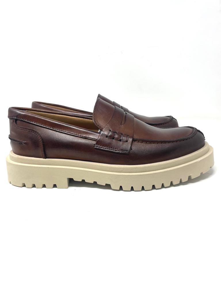 Mocassino rocciatore  vera pelle fondo ambra
made in italy