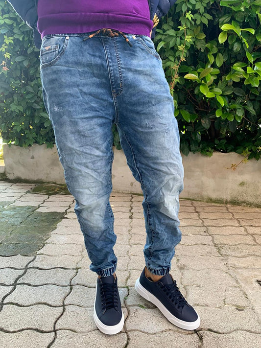 Faded jeans with elastic waist and ankle