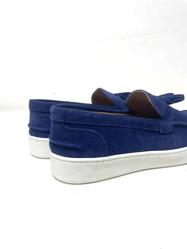 Boat moccasin with tassels in suede rubber sole