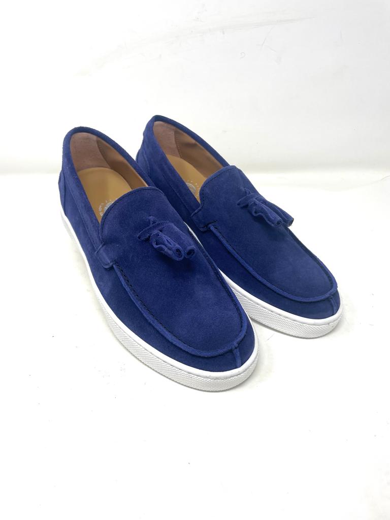 Boat moccasin with tassels in suede rubber sole
