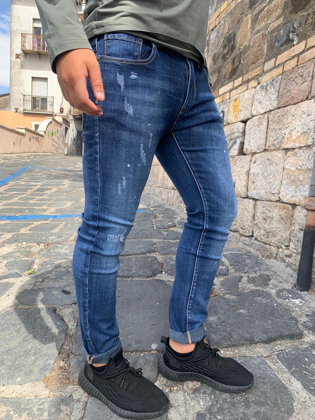 regular fit jeans with tears and splashes