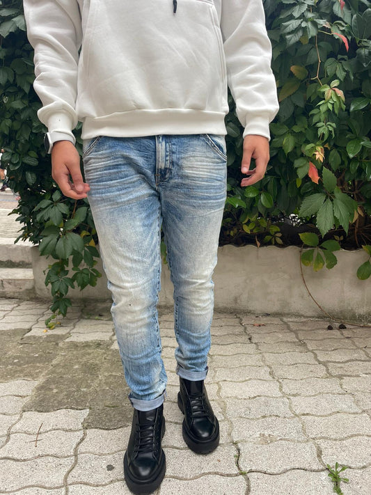 Jeans regular fit lavaggio chiaro super stone washed con cimosa in puro cotone