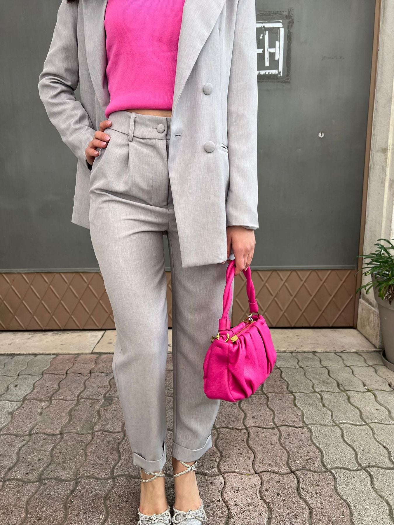 Trousers with pleat and double pleat